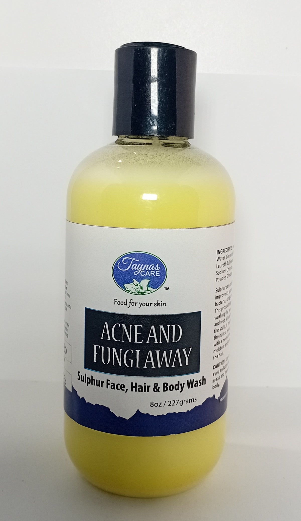 Taynas Body Care ACNE & FUNGI AWAY Sulphur Face, Hair & Body Wash, facial care product in a white bottle with blue label.
